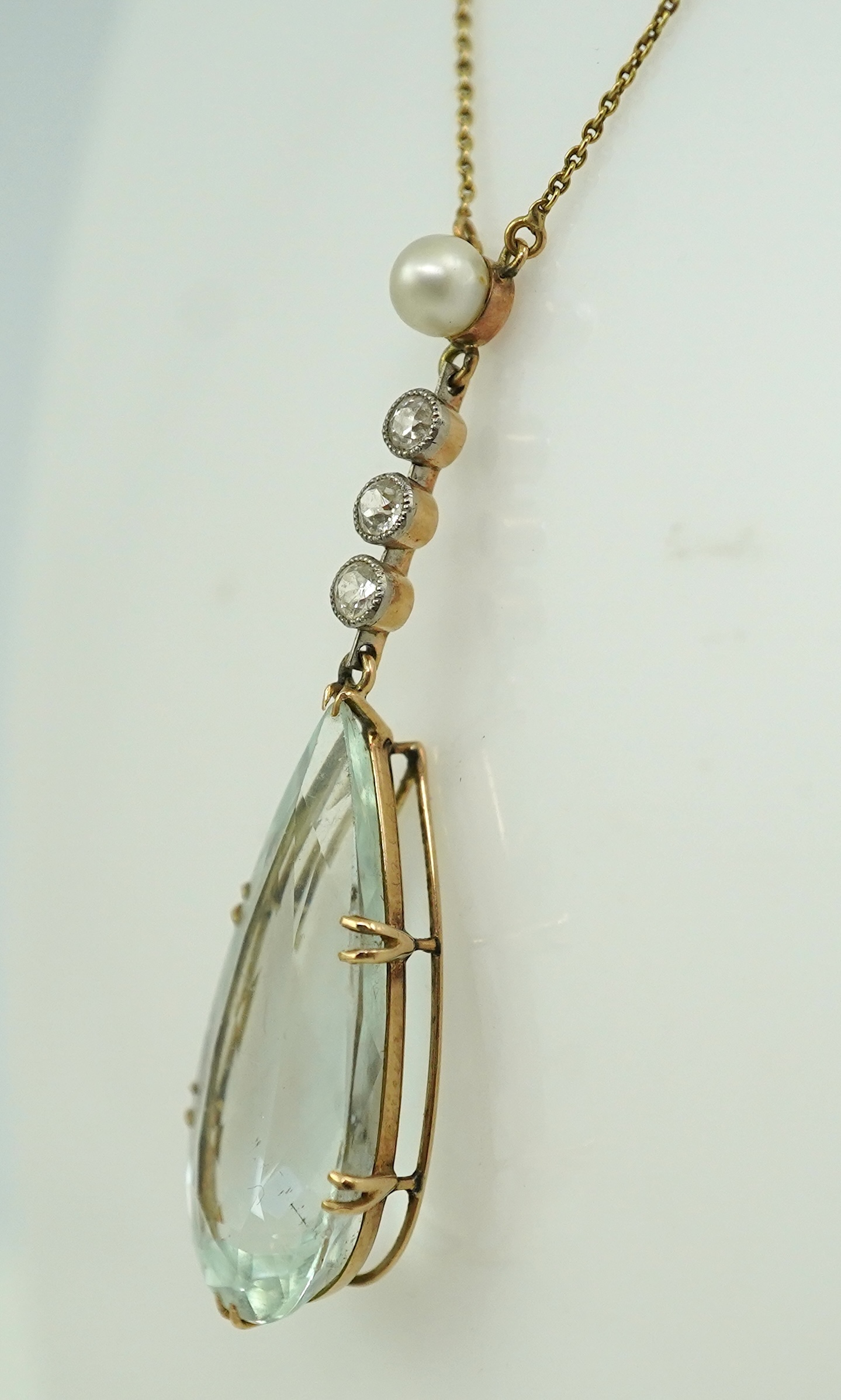 An Edwardian aquamarine, pearl and diamond pendant, early 20th century